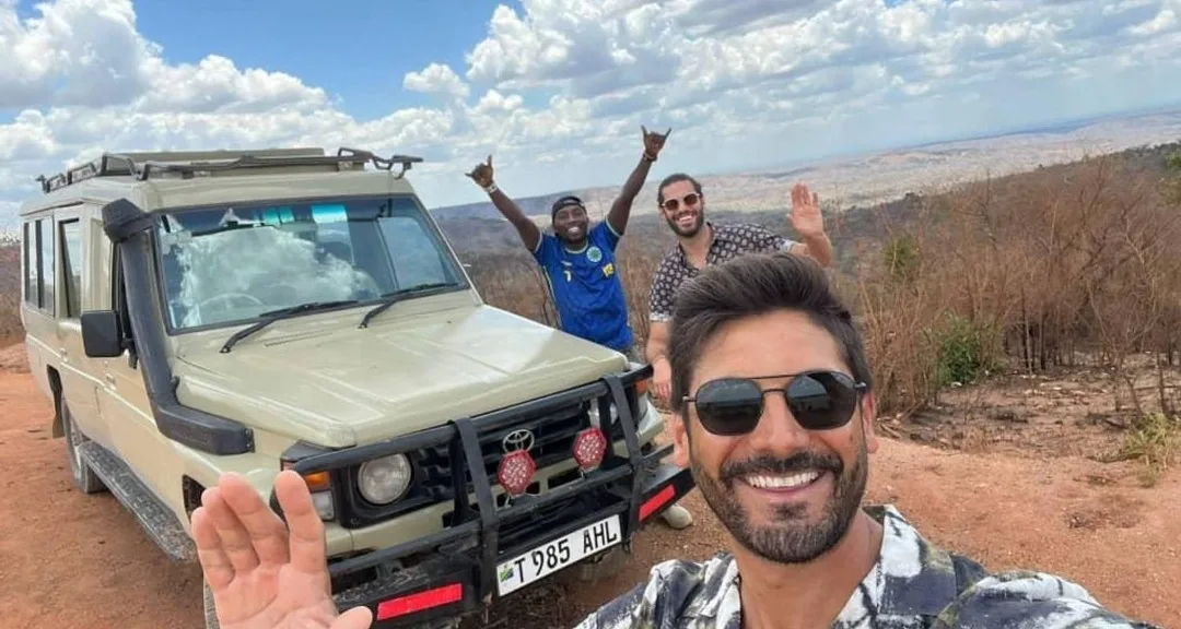 Africantrust Safari climbers preparing for a Mount Kilimanjaro expedition from Moshi with experienced Tanzanian mountain guides before starting their trek.
